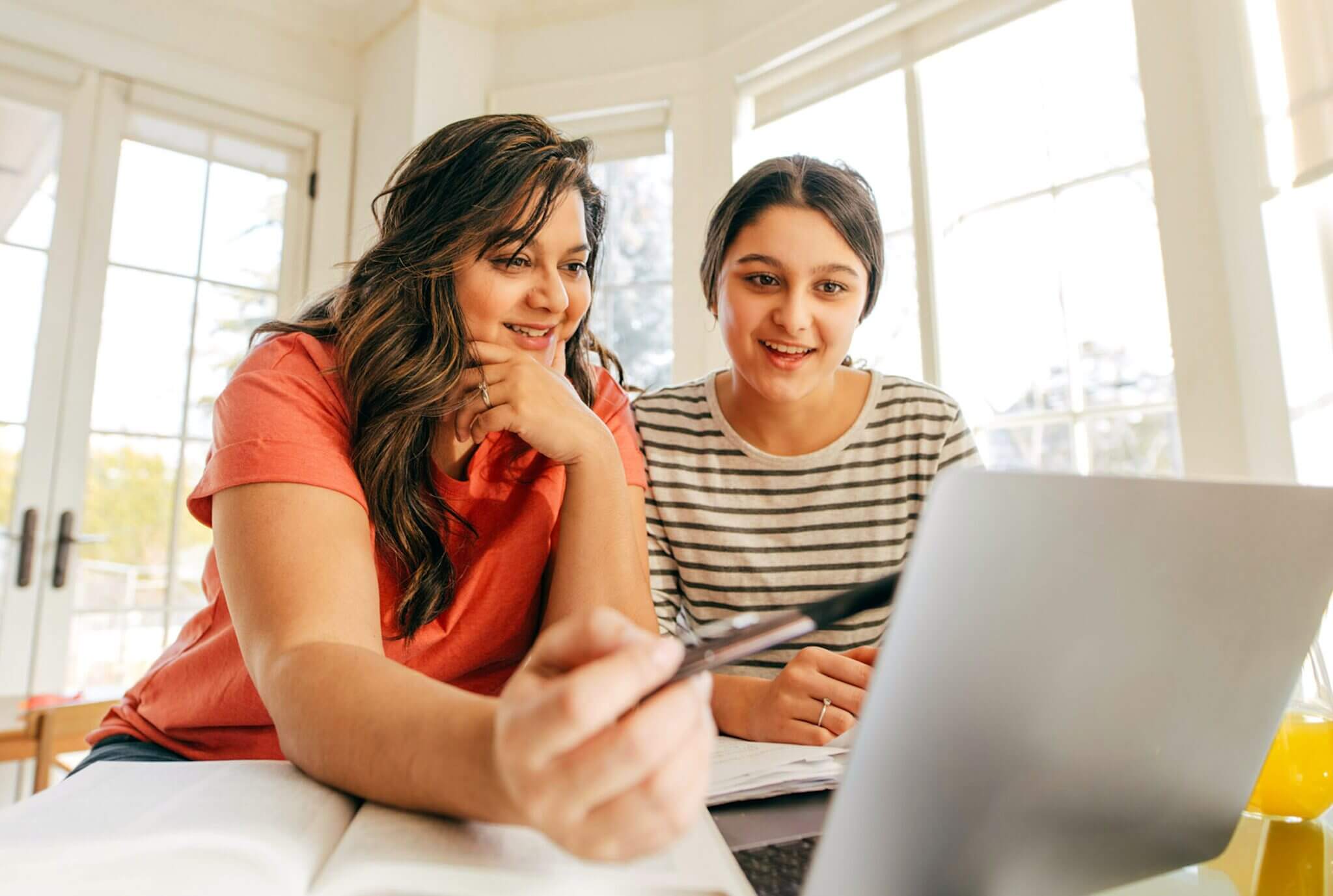 Parent Helping Child With Homework